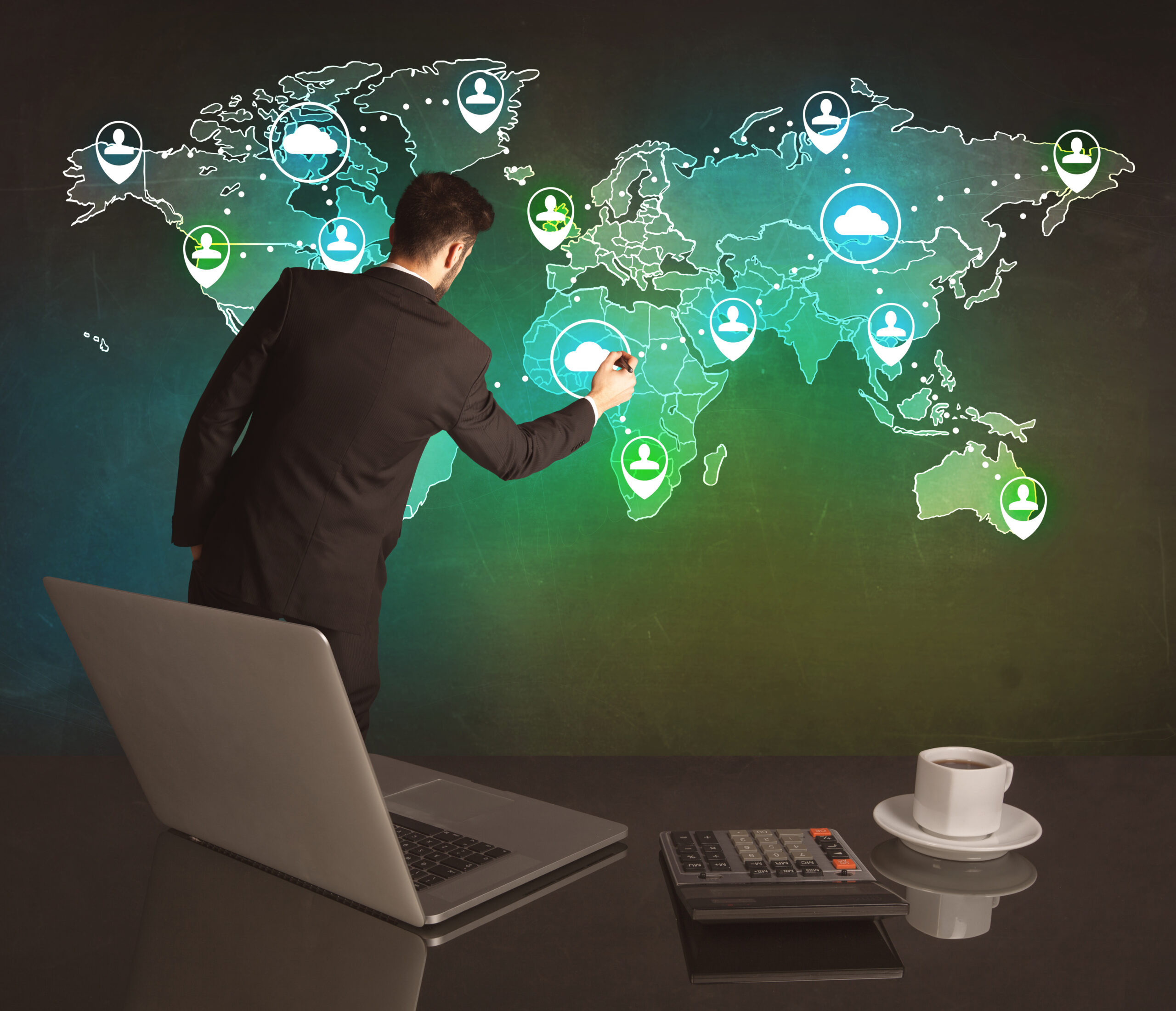 Businessman interacting with a world map representing CNS Limo’s global chauffeur network.